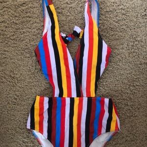 Cut-out one piece suit